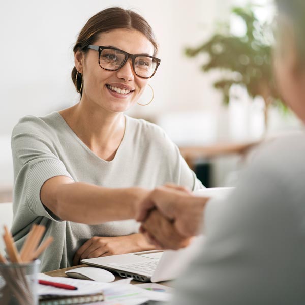 Houston personal injury attorney shaking hands with client