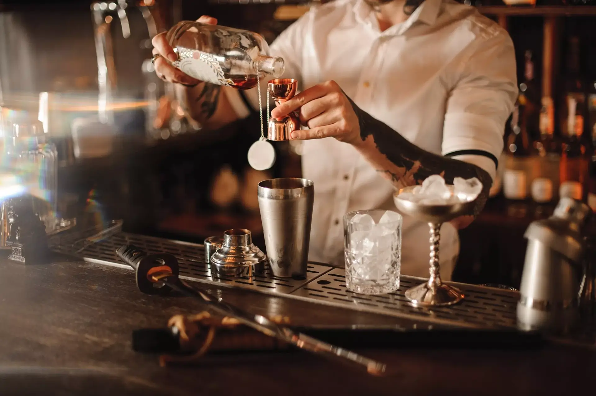 Bartender violating Texas dram shop law by overserving patron.