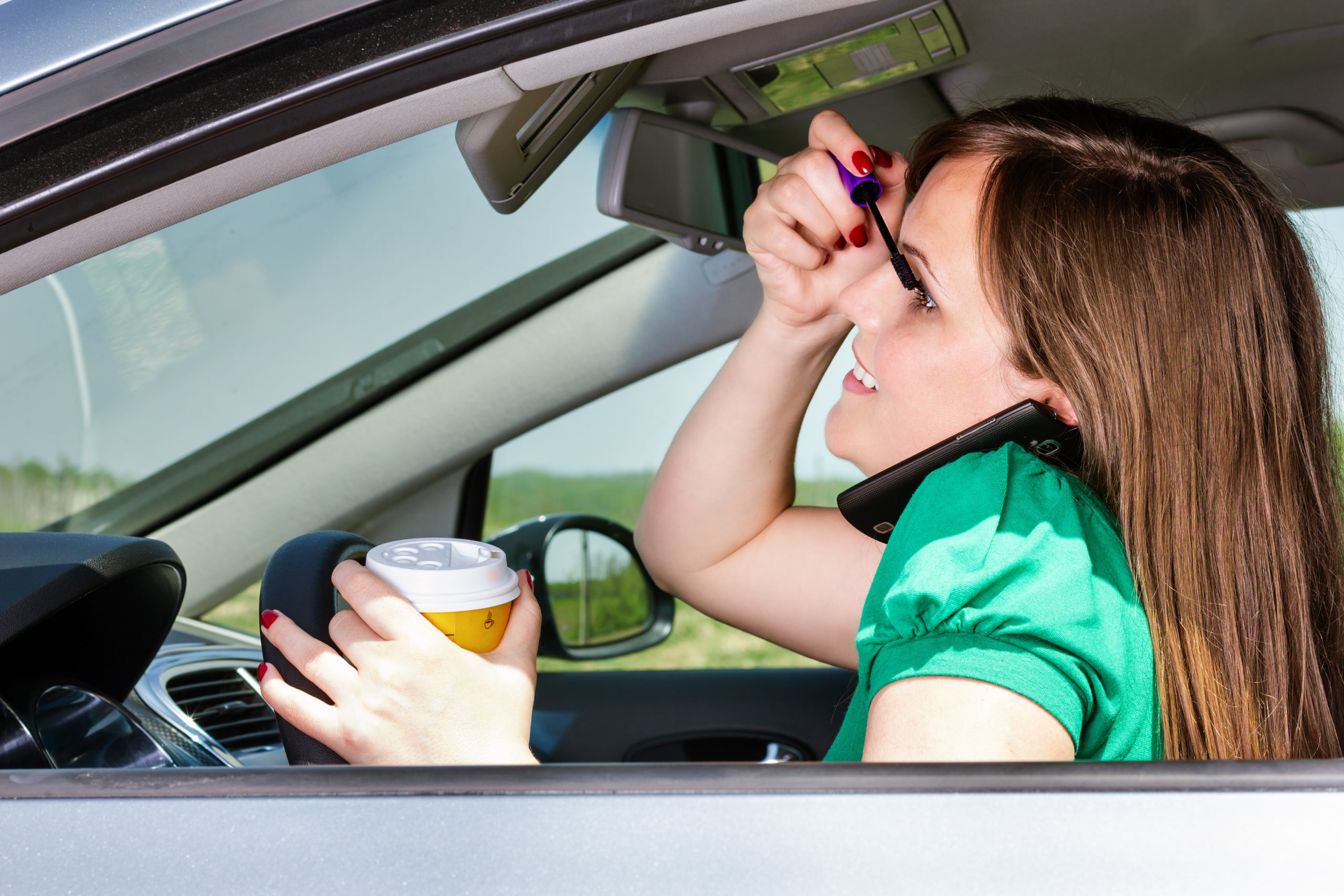 Cell phones, eating, and grooming, are among common distracted driving activities that can lead to car accidents.
