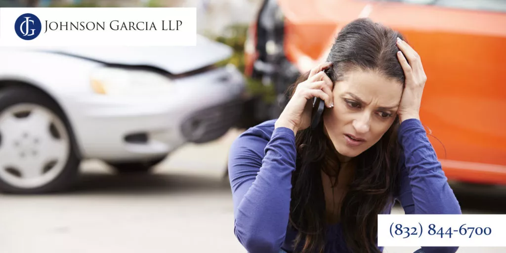 woman calling a Houston personal injury lawyer