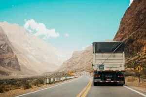 truck driving through valley